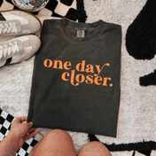 One Day Closer Graphic