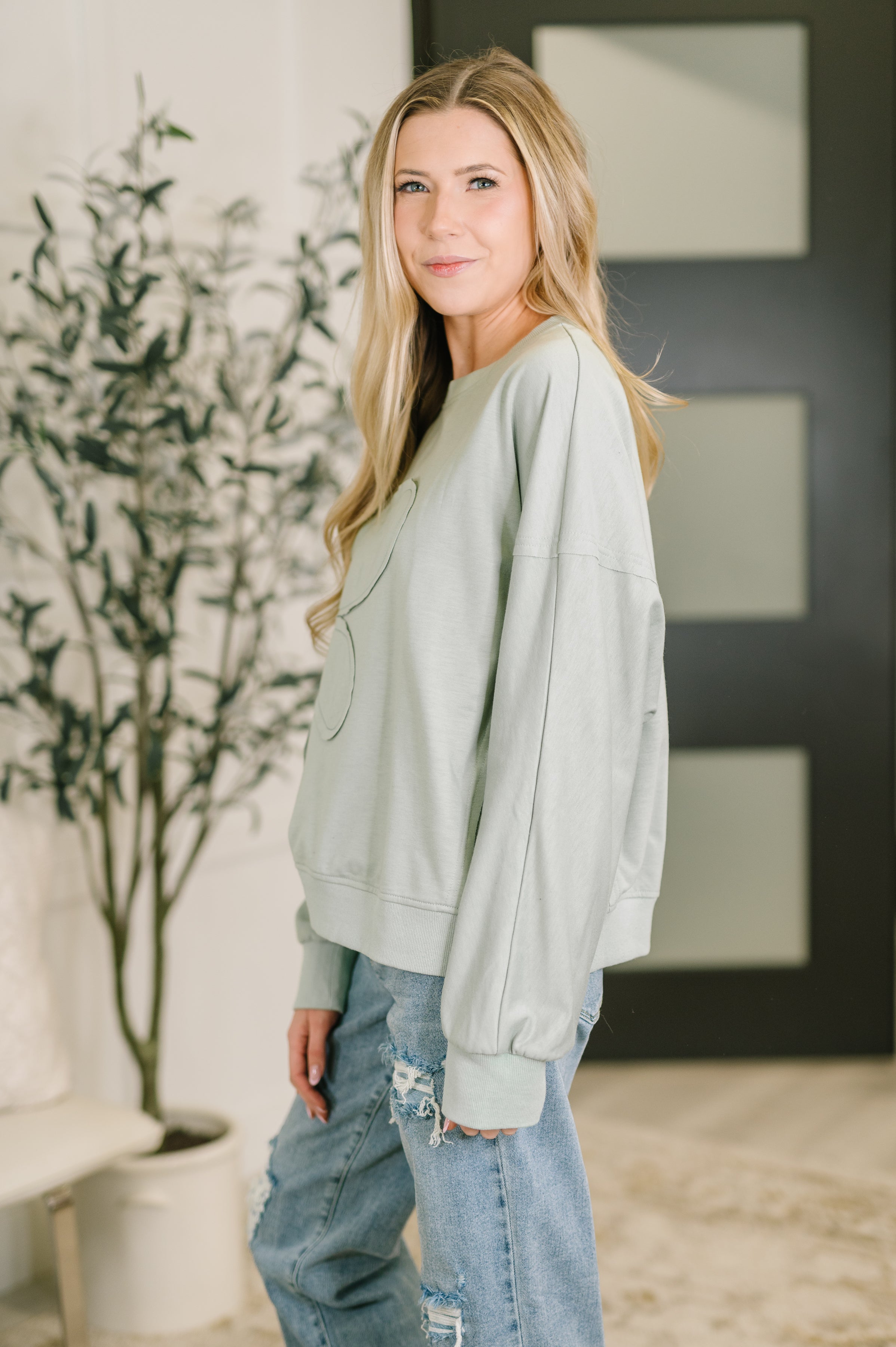 Petal Poise Floral Applique Pullover in Ivy